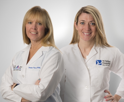 Dr Kelly LoPresti standing next to another doctor