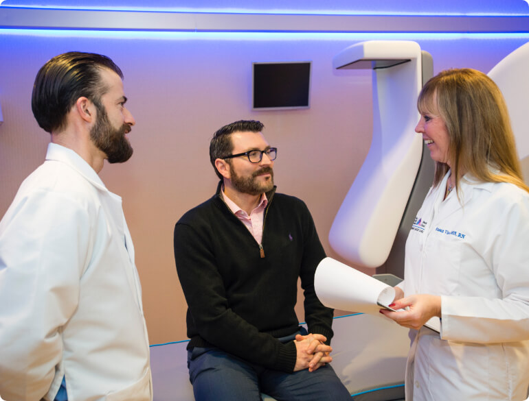 Doctors assess a patient after Gamma Knife radiosurgery treatment