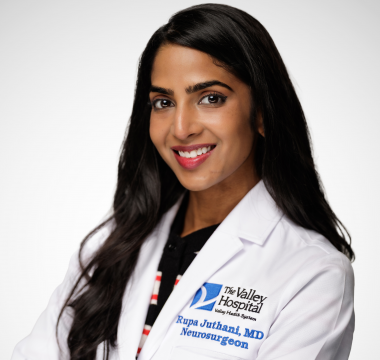 neurosurgeon rupa juthani (npi 1194042317) posing for a photo